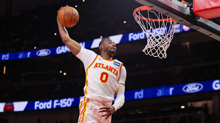 Mar 1, 2026; Atlanta, Georgia, USA; Atlanta Hawks forward Jonathan Kuminga (0) dunks against the Portland Trail Blazers in the fourth quarter at State Farm Arena. Mandatory Credit: Brett Davis-Imagn Images

