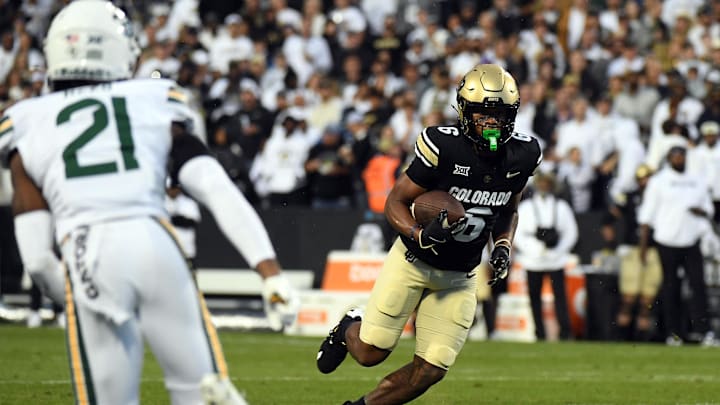 Sep 21, 2024; Boulder, Colorado, USA; Colorado Buffaloes wide receiver Drelon Miller (6) runs after a reception during the first half against the Baylor Bears at Folsom Field. Mandatory Credit: Christopher Hanewinckel-Imagn Images
