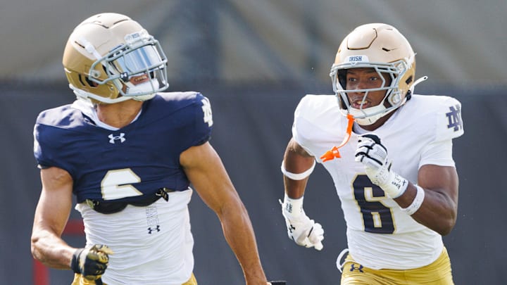 Notre Dame defensive back Christian Gray, right, chases down wide receiver Jordan Faison during a football practice at Irish Athletic Center on Saturday, Aug. 2, 2025, in South Bend.