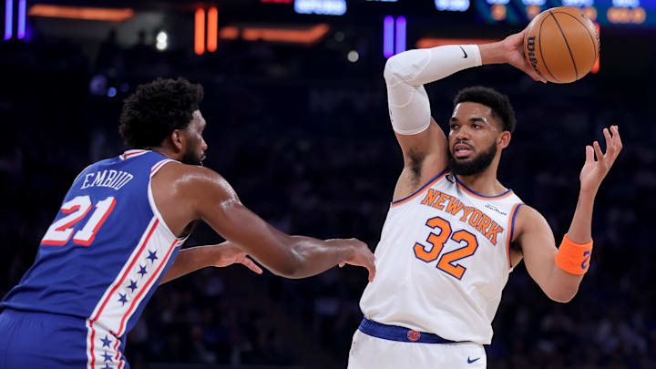 Knicks center Karl-Anthony Towns attacking Joel Embiid on Monday.