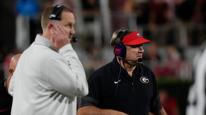 Georgia Bulldogs coach Kirby Smart and Georgia Bulldogs Defensive Glenn Schumann look on during the second half of a NCAA college football game against Alabama in Athens, Ga., on Saturday, September 27, 2025.