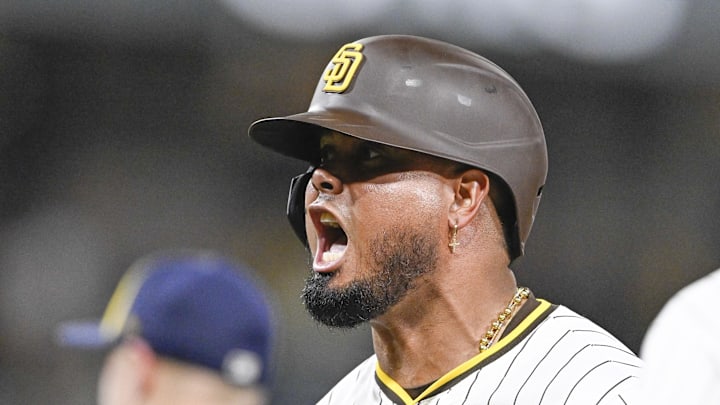 Sep 22, 2025; San Diego, California, USA; San Diego Padres first baseman Luis Arraez (4) celebrates after hitting an RBI single during the seventh inning against the Milwaukee Brewers at Petco Park. Mandatory Credit: Denis Poroy-Imagn Images Sep 22, 2025; San Diego, California, USA; San Diego Padres first baseman Luis Arraez (4) celebrates after hitting an RBI single during the seventh inning against the Milwaukee Brewers at Petco Park. Mandatory Credit: Denis Poroy-Imagn Images
