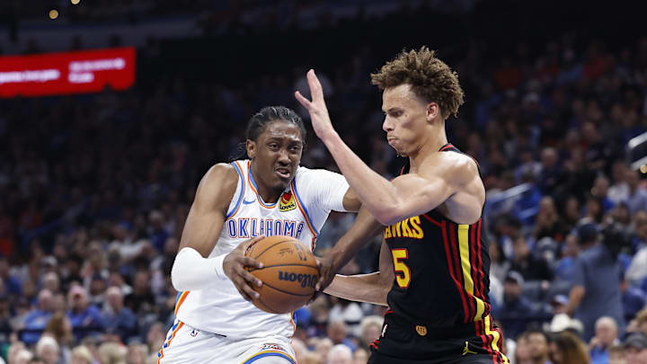 Oct 27, 2024; Oklahoma City, Oklahoma, USA; Oklahoma City Thunder forward Jalen Williams (8) drives to the basket against Atlanta Hawks guard Dyson Daniels (5) during the second half at Paycom Center. Mandatory Credit: Alonzo Adams-Imagn Images Oct 27, 2024; Oklahoma City, Oklahoma, USA; Oklahoma City Thunder forward Jalen Williams (8) drives to the basket against Atlanta Hawks guard Dyson Daniels (5) during the second half at Paycom Center. Mandatory Credit: Alonzo Adams-Imagn Images