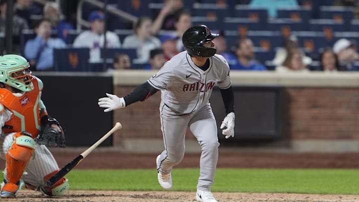 Apr 30, 2025; New York City, New York, USA; Arizona Diamondbacks center fielder Jorge Barrosa (1) hits a sacrifice fly ball against the New York Mets during the ninth inning at Citi Field. Mandatory Credit: Gregory Fisher-Imagn Images