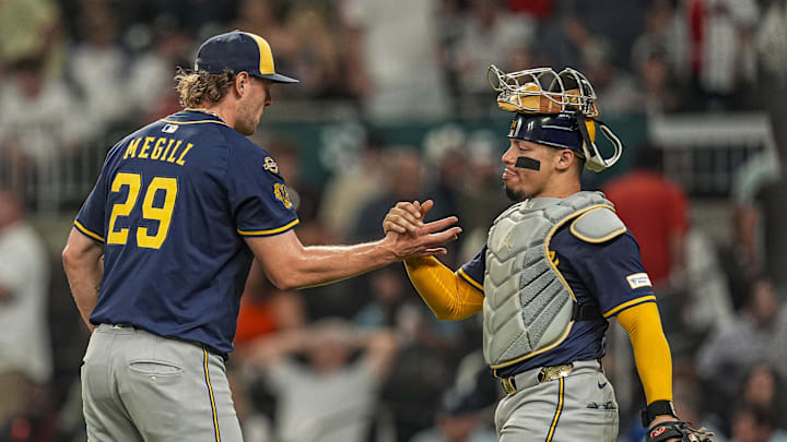 Aug 6, 2025; Cumberland, Georgia, USA; Milwaukee Brewers pitcher Trevor Megill (29) and catcher William Contreras (24) react after defeating the Atlanta Braves at Truist Park. Mandatory Credit: Dale Zanine-Imagn Images Aug 6, 2025; Cumberland, Georgia, USA; Milwaukee Brewers pitcher Trevor Megill (29) and catcher William Contreras (24) react after defeating the Atlanta Braves at Truist Park. Mandatory Credit: Dale Zanine-Imagn Images
