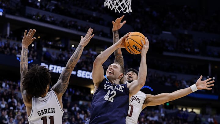 March 20, 2025; Denver, CO, USA; Yale Bulldogs forward Nick Townsend (42) attempts to shoot the ball against the Texas A&M Aggies at Ball Arena. Mandatory Credit: Isaiah J. Downing-Imagn Images