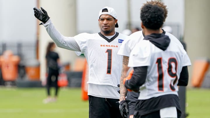 Cincinnati Bengals wide receiver Ja’Marr Chase (1) speaks with teammates during practice, Tuesday, May 6, 2025, at the Kettering Health Practice Field in Downtown Cincinnati.