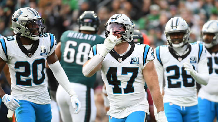 Dec 8, 2024; Philadelphia, Pennsylvania, USA; Carolina Panthers linebacker Josey Jewell (47) reacts after sacking Philadelphia Eagles quarterback Jalen Hurts (1) during the first quarter at Lincoln Financial Field. Mandatory Credit: Eric Hartline-Imagn Images