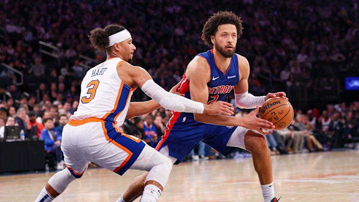 Dec 7, 2024; New York, New York, USA; Detroit Pistons guard Cade Cunningham (2) is defended by New York Knicks guard Josh Hart (3) during the first half at Madison Square Garden. Mandatory Credit: Vincent Carchietta-Imagn Images