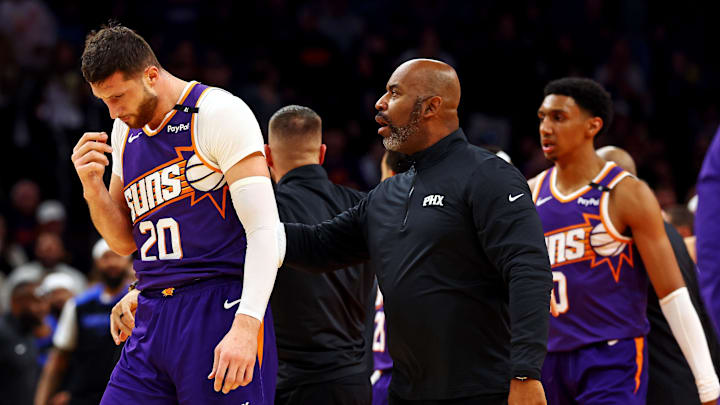 Dec 27, 2024; Phoenix, Arizona, USA; Phoenix Suns center Jusuf Nurkic (20) walks off the court after being punched by Dallas Mavericks forward Naji Marshall (not pictured) at Footprint Center. Mandatory Credit: Mark J. Rebilas-Imagn Images