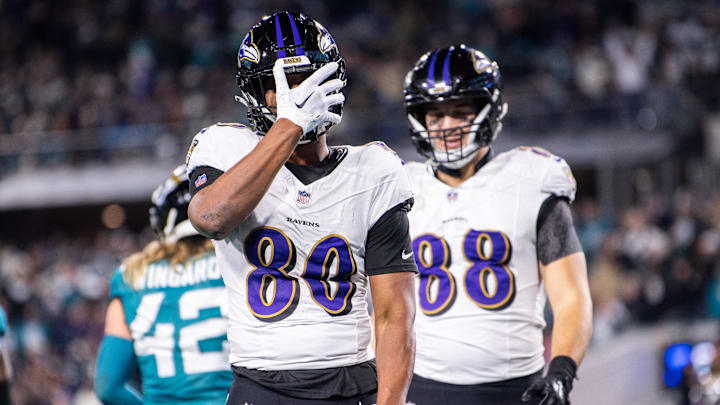Dec 17, 2023; Jacksonville, Florida, USA; Baltimore Ravens tight end Isaiah Likely (80) celebrates his touchdown against the Jacksonville Jaguars in the second quarter at EverBank Stadium. Mandatory Credit: Jeremy Reper-Imagn Images
