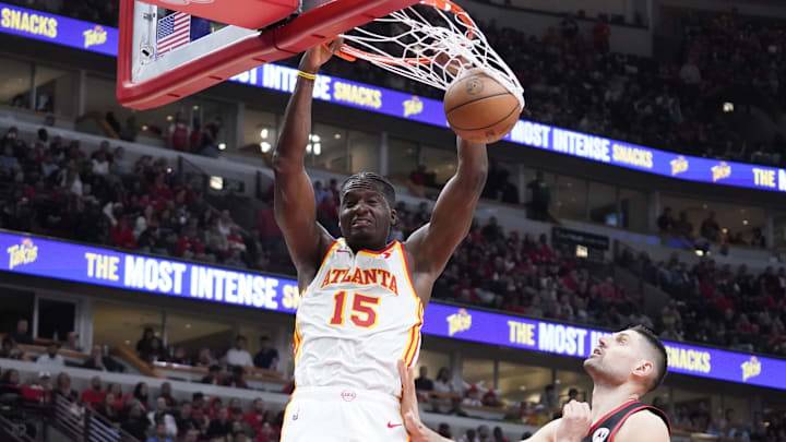Apr 17, 2024; Chicago, Illinois, USA; Atlanta Hawks center Clint Capela (15) dunks the ball on Chicago Bulls center Nikola Vucevic (9) during the second half during a play-in game of the 2024 NBA playoffs at United Center. Mandatory Credit: David Banks-Imagn Images Apr 17, 2024; Chicago, Illinois, USA; Atlanta Hawks center Clint Capela (15) dunks the ball on Chicago Bulls center Nikola Vucevic (9) during the second half during a play-in game of the 2024 NBA playoffs at United Center. Mandatory Credit: David Banks-Imagn Images