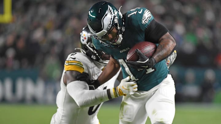 Dec 15, 2024; Philadelphia, Pennsylvania, USA; Philadelphia Eagles running back Kenneth Gainwell (14) is tackled by Pittsburgh Steelers linebacker Patrick Queen (6) during the third quarter at Lincoln Financial Field. Dec 15, 2024; Philadelphia, Pennsylvania, USA; Philadelphia Eagles running back Kenneth Gainwell (14) is tackled by Pittsburgh Steelers linebacker Patrick Queen (6) during the third quarter at Lincoln Financial Field.
