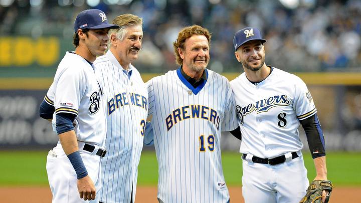 Mar 28, 2019; Milwaukee, WI, USA; Milwaukee Brewers outfielder Christian Yelich (22) and outfielder Ryan Braun (8) pose for a photo with former Brewers Rollie Fingers and Robin Yount after they threw out ceremonial first pitches before their game against the St. Louis Cardinals at Miller Park. Mandatory Credit: Michael McLoone-USA TODAY Sports Mar 28, 2019; Milwaukee, WI, USA; Milwaukee Brewers outfielder Christian Yelich (22) and outfielder Ryan Braun (8) pose for a photo with former Brewers Rollie Fingers and Robin Yount after they threw out ceremonial first pitches before their game against the St. Louis Cardinals at Miller Park. Mandatory Credit: Michael McLoone-USA TODAY Sports