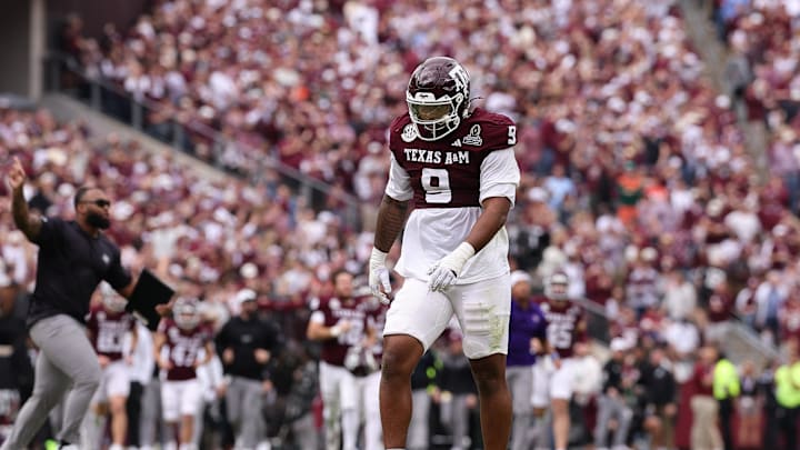 Dec 20, 2025; College Station, TX, USA; Texas A&M Aggies defensive end Cashius Howell (9) reacts during first half of the first round game of the CFP National Playoff against the Miami Hurricanes at Kyle Field. Mandatory Credit: Maria Lysaker-Imagn Images