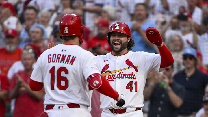 Jun 10, 2025; St. Louis, Missouri, USA;  St. Louis Cardinals second baseman Nolan Gorman (16) is congratulated by right fielder Alec Burleson (41) after hitting a three run home run against the Toronto Blue Jays during the fourth inning at Busch Stadium. Mandatory Credit: Jeff Curry-Imagn Images
