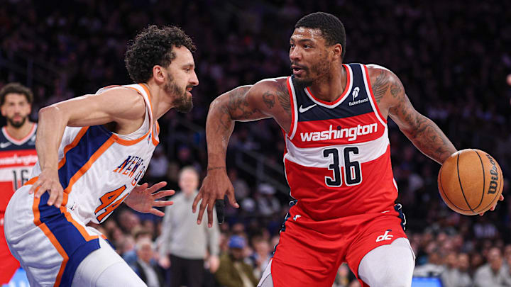 Mar 22, 2025; New York, New York, USA; Washington Wizards guard Marcus Smart (36) dribbles after the game New York Knicks guard Landry Shamet (44) during the second half at Madison Square Garden. Mandatory Credit: Vincent Carchietta-Imagn Images