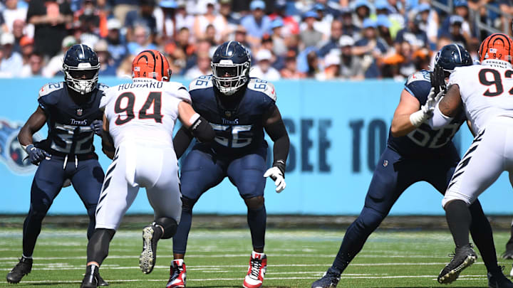 Oct 1, 2023; Nashville, Tennessee, USA; Tennessee Titans offensive tackle Chris Hubbard (66) blocks against Cincinnati Bengals defensive end Sam Hubbard (94) during the first half at Nissan Stadium. Mandatory Credit: Christopher Hanewinckel-Imagn Images