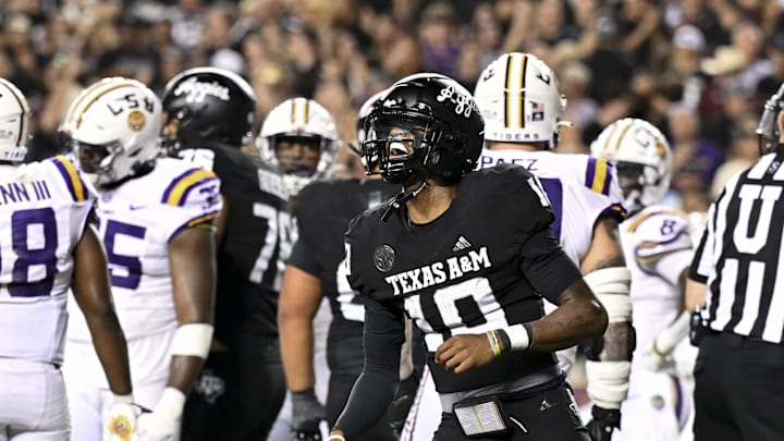 Oct 26, 2024; College Station, Texas, USA; Texas A&M Aggies quarterback Marcel Reed (10) celebrates after scoring a touchdown in the third quarter against the LSU Tigers at Kyle Field. Mandatory Credit: Maria Lysaker-Imagn Images. 