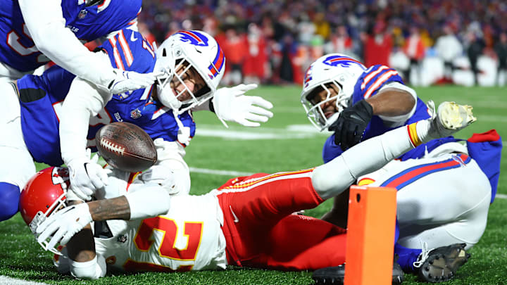 Jan 21, 2024; Orchard Park, New York, USA; Buffalo Bills safety Jordan Poyer (21) causes a fumble on Kansas City Chiefs wide receiver Mecole Hardman Jr. (12) through the end zone for a touchback during the second half for the 2024 AFC divisional round game