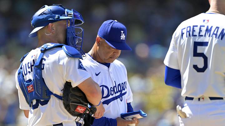 Jul 6, 2025; Los Angeles, California, USA;  Los Angeles Dodgers catcher Dalton Rushing (68) waits with manager Dave Roberts (30) on the mound during a pitching change in the eighth inning against the Houston Astros at Dodger Stadium. Mandatory Credit: Jayne Kamin-Oncea-Imagn Images