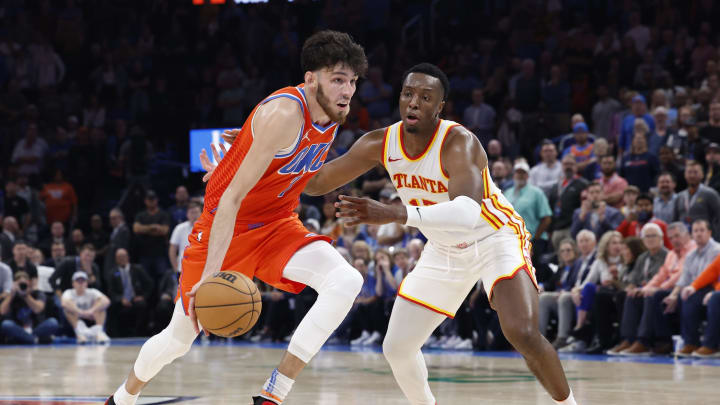 Nov 6, 2023; Oklahoma City, Oklahoma, USA; Oklahoma City Thunder forward Chet Holmgren (7) drives against Atlanta Hawks forward Onyeka Okongwu (17) during the second half at Paycom Center. Oklahoma City won 126-117. Mandatory Credit: Alonzo Adams-USA TODAY Sports Nov 6, 2023; Oklahoma City, Oklahoma, USA; Oklahoma City Thunder forward Chet Holmgren (7) drives against Atlanta Hawks forward Onyeka Okongwu (17) during the second half at Paycom Center. Oklahoma City won 126-117. Mandatory Credit: Alonzo Adams-USA TODAY Sports