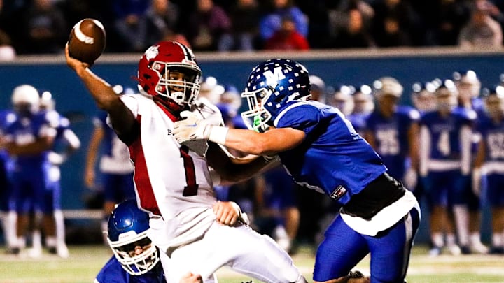 Brockton's Cameron Monteiro gets hit as he throws during a game against Methuen in the Division 1 state tournament on Friday, Nov. 4, 2022.

Methuen7 2