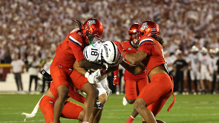 Sep 27, 2025; Ames, Iowa, USA; Iowa State Cyclones tight end Benjamin Brahmer (18) catches a pass in front of Arizona Wildcats defensive back Marquis Groves-Killebrew (5) during the first half at Jack Trice Stadium. Mandatory Credit: Reese Strickland-Imagn Images Sep 27, 2025; Ames, Iowa, USA; Iowa State Cyclones tight end Benjamin Brahmer (18) catches a pass in front of Arizona Wildcats defensive back Marquis Groves-Killebrew (5) during the first half at Jack Trice Stadium. Mandatory Credit: Reese Strickland-Imagn Images