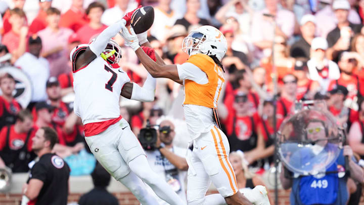 Tennessee wide receiver Chris Brazzell II (17) makes a touchdown reception while defended by Georgia defensive back Daniel Harris (7) in an NCAA college football game on September 13, 2025, Knoxville, Tennessee.