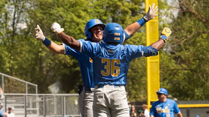 UCLA’s Dean West, left, celebrates his first inning home run with teammate Roman Martin at PK Park in Eugene. UCLA’s Dean West, left, celebrates his first inning home run with teammate Roman Martin at PK Park in Eugene.