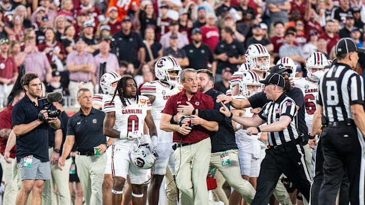 Dec 31, 2024; Orlando, FL, USA; South Carolina Gamecocks head coach Shane Beamer reacts to the Illinois Fighting Illini in the third quarter at Camping World Stadium. Mandatory Credit: Jeremy Reper-Imagn Images Dec 31, 2024; Orlando, FL, USA; South Carolina Gamecocks head coach Shane Beamer reacts to the Illinois Fighting Illini in the third quarter at Camping World Stadium. Mandatory Credit: Jeremy Reper-Imagn Images