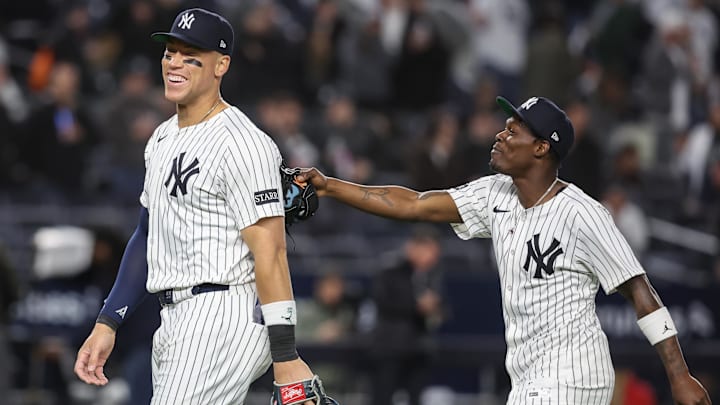 Apr 15, 2025; Bronx, New York, USA;  New York Yankees right fielder Aaron Judge (99) celebrates with second baseman Jazz Chisholm Jr. (13) after defeating the Kansas City Royals 4-2 at Yankee Stadium. All players wore #42 for Jackie Robinson Day.  Mandatory Credit: Wendell Cruz-Imagn Images