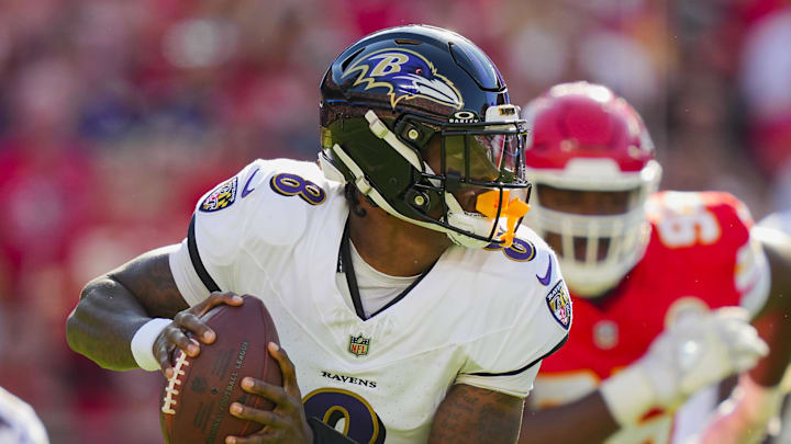 Sep 28, 2025; Kansas City, Missouri, USA; Baltimore Ravens quarterback Lamar Jackson (8) rolls out to pass during the first half against the Kansas City Chiefs at GEHA Field at Arrowhead Stadium. Mandatory Credit: Jay Biggerstaff-Imagn Images Sep 28, 2025; Kansas City, Missouri, USA; Baltimore Ravens quarterback Lamar Jackson (8) rolls out to pass during the first half against the Kansas City Chiefs at GEHA Field at Arrowhead Stadium. Mandatory Credit: Jay Biggerstaff-Imagn Images