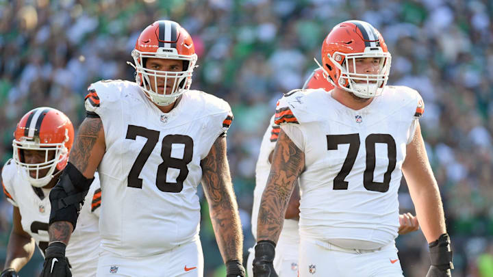 Oct 13, 2024; Philadelphia, Pennsylvania, USA; Cleveland Browns offensive tackle Jack Conklin (78) and guard Zak Zinter (70) against the Philadelphia Eagles at Lincoln Financial Field. Mandatory Credit: Eric Hartline-Imagn Images