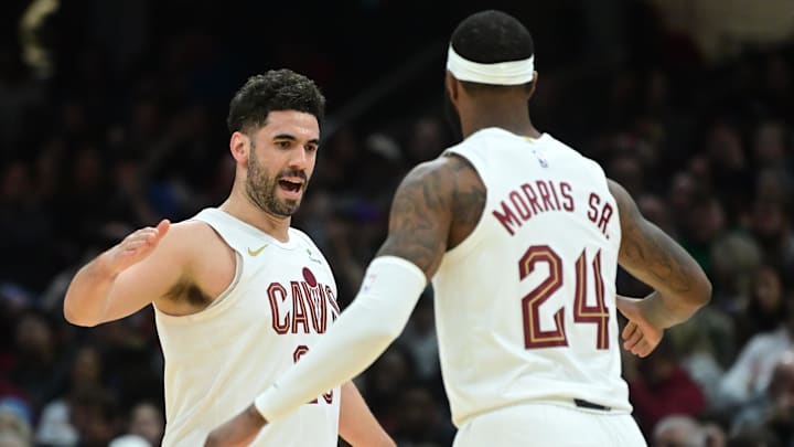 Mar 29, 2024; Cleveland, Ohio, USA; Cleveland Cavaliers forward Georges Niang (20) celebrates with Mar 29, 2024; Cleveland, Ohio, USA; Cleveland Cavaliers forward Georges Niang (20) celebrates with