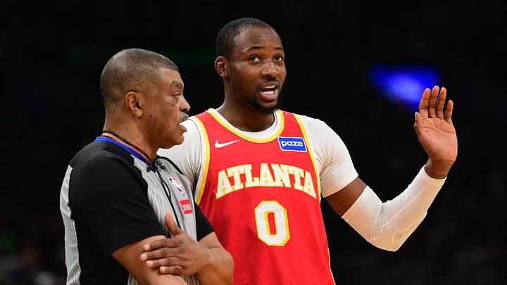 Mar 27, 2026; Boston, Massachusetts, USA; Atlanta Hawks forward Jonathan Kuminga (0) talks with an official during the second half against the Boston Celtics at TD Garden. Mandatory Credit: Bob DeChiara-Imagn Images