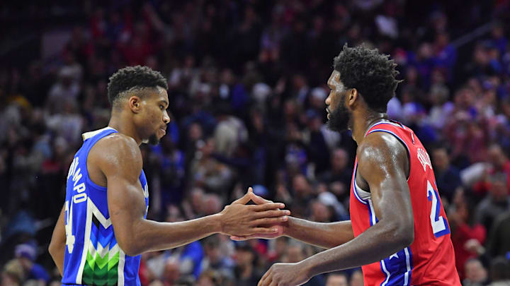 Nov 18, 2022; Philadelphia, Pennsylvania, USA; Milwaukee Bucks forward Giannis Antetokounmpo (34) and Philadelphia 76ers center Joel Embiid (21) congradulate each other after game at Wells Fargo Center. Mandatory Credit: Eric Hartline-Imagn Images
