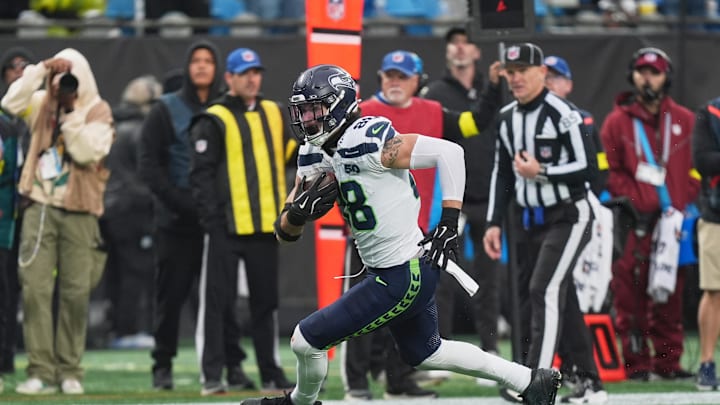 Seattle Seahawks tight end AJ Barner (88) runs after the catch for a seventeen-yard touchdown.