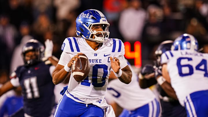 Nov 8, 2025; East Hartford, Connecticut, USA; Duke Blue Devils quarterback Darian Mensah (10) throws a pass against the UConn Huskies in the second half at Pratt & Whitney Stadium at Rentschler Field. Mandatory Credit: David Butler II-Imagn Images