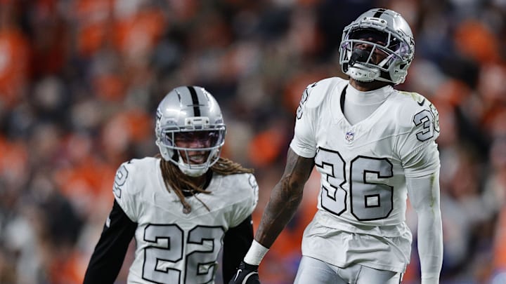 Nov 6, 2025; Denver, Colorado, USA; Las Vegas Raiders cornerback Kyu Blu Kelly (36) reacts after making an interception against the Denver Broncos during the first half at Empower Field at Mile High. Nov 6, 2025; Denver, Colorado, USA; Las Vegas Raiders cornerback Kyu Blu Kelly (36) reacts after making an interception against the Denver Broncos during the first half at Empower Field at Mile High.