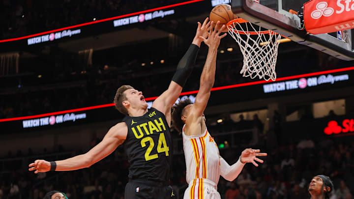 Feb 27, 2024; Atlanta, Georgia, USA; Utah Jazz center Walker Kessler (24) defends Atlanta Hawks forward Jalen Johnson (1) in the second quarter at State Farm Arena. Mandatory Credit: Brett Davis-Imagn Images Feb 27, 2024; Atlanta, Georgia, USA; Utah Jazz center Walker Kessler (24) defends Atlanta Hawks forward Jalen Johnson (1) in the second quarter at State Farm Arena. Mandatory Credit: Brett Davis-Imagn Images