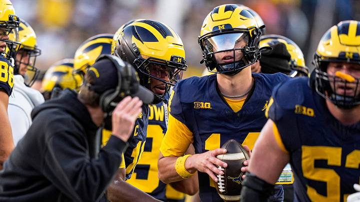 Michigan quarterback Bryce Underwood (19) cheers on quarterback Tommy Carr (14) at a timeout against Penn State during the second half at Michigan Stadium in Ann Arbor on Saturday, Oct. 17, 2026. Michigan quarterback Bryce Underwood (19) cheers on quarterback Tommy Carr (14) at a timeout against Penn State during the second half at Michigan Stadium in Ann Arbor on Saturday, Oct. 17, 2026.