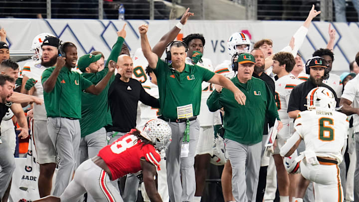 Miami Hurricanes head coach Mario Cristobal celebrates during the Cotton Bowl at AT&T Stadium in Arlington, Texas for the College Football Playoff quarterfinal game against the Ohio State Buckeyes on Dec. 31, 2025. Ohio State lost 24-14.