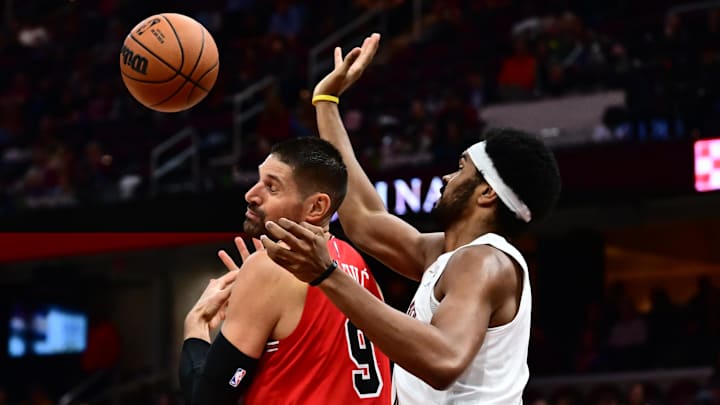 Oct 7, 2025; Cleveland, Ohio, USA; Cleveland Cavaliers center Jarrett Allen (31) knocks the ball from Chicago Bulls center Nikola Vucevic (9) during the second half at Rocket Arena. Mandatory Credit: Ken Blaze-Imagn Images