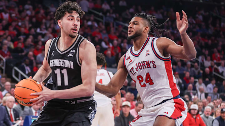 Georgetown Hoyas center Julius Halaifonua (left)