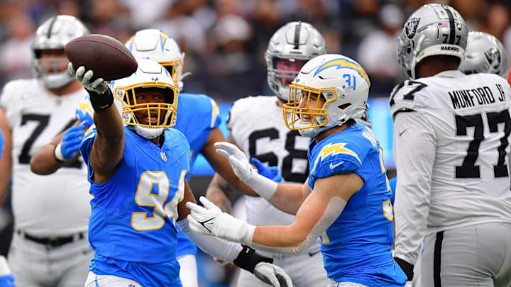 Oct 1, 2023; Inglewood, California, USA; Los Angeles Chargers linebacker Chris Rumph II (94) celebrates after recovering the ball against the Las Vegas Raiders during the first half at SoFi Stadium. Mandatory Credit: Gary A. Vasquez-USA TODAY Sports