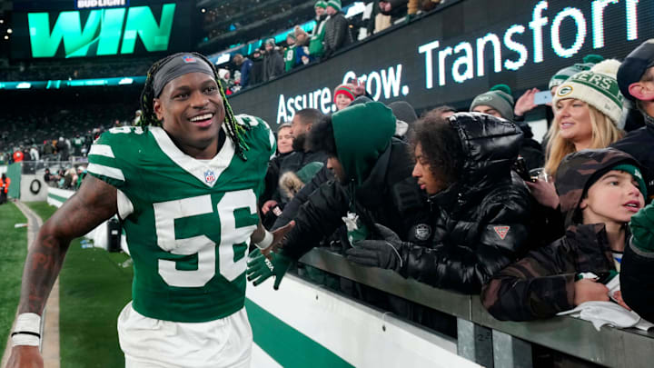 New York Jets linebacker Quincy Williams (56) gives high-fives to fans after Gang Green who their final game of the season, 32-20, Sunday January 5, 2025, in East Rutherford. New York Jets linebacker Quincy Williams (56) gives high-fives to fans after Gang Green who their final game of the season, 32-20, Sunday January 5, 2025, in East Rutherford.