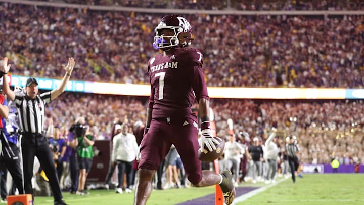 Oct 25, 2025; Baton Rouge, Louisiana, USA; Texas A&M Aggies wide receiver KC Concepcion (7) returns a punt for a touchdown during the second half against the Louisiana State Tigers at Tiger Stadium. Mandatory Credit: Stephen Lew-Imagn Images