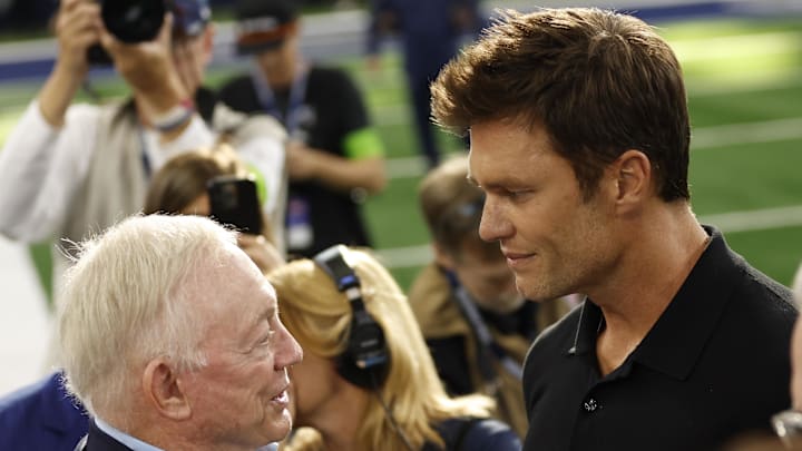 Aug 26, 2023; Arlington, Texas, USA; Dallas Cowboys owner Jerry Jones (L) talks to former NFL player Tom Brady (R) before the game against the Las Vegas Raiders at AT&T Stadium. Mandatory Credit: Tim Heitman-Imagn Images