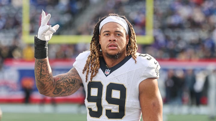 Dec 8, 2024; East Rutherford, New Jersey, USA; New Orleans Saints defensive end Chase Young (99) looks up at fans before the game against the New York Giants at MetLife Stadium. Mandatory Credit: Vincent Carchietta-Imagn Images